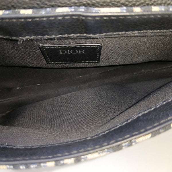 Authenticated pre-owned  Saddle Monogram Canvas Blue - Shoulder Bag at Looply