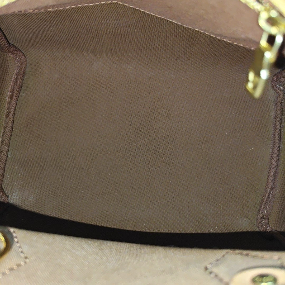 SPEEDY 25 Monogram Coated Canvas Brown