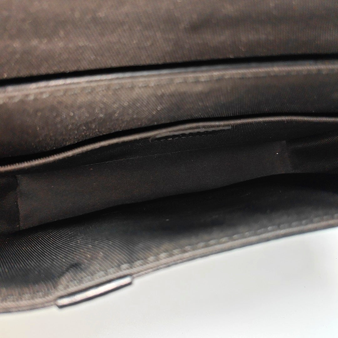 TRUNK PM Monogram Coated Canvas Black