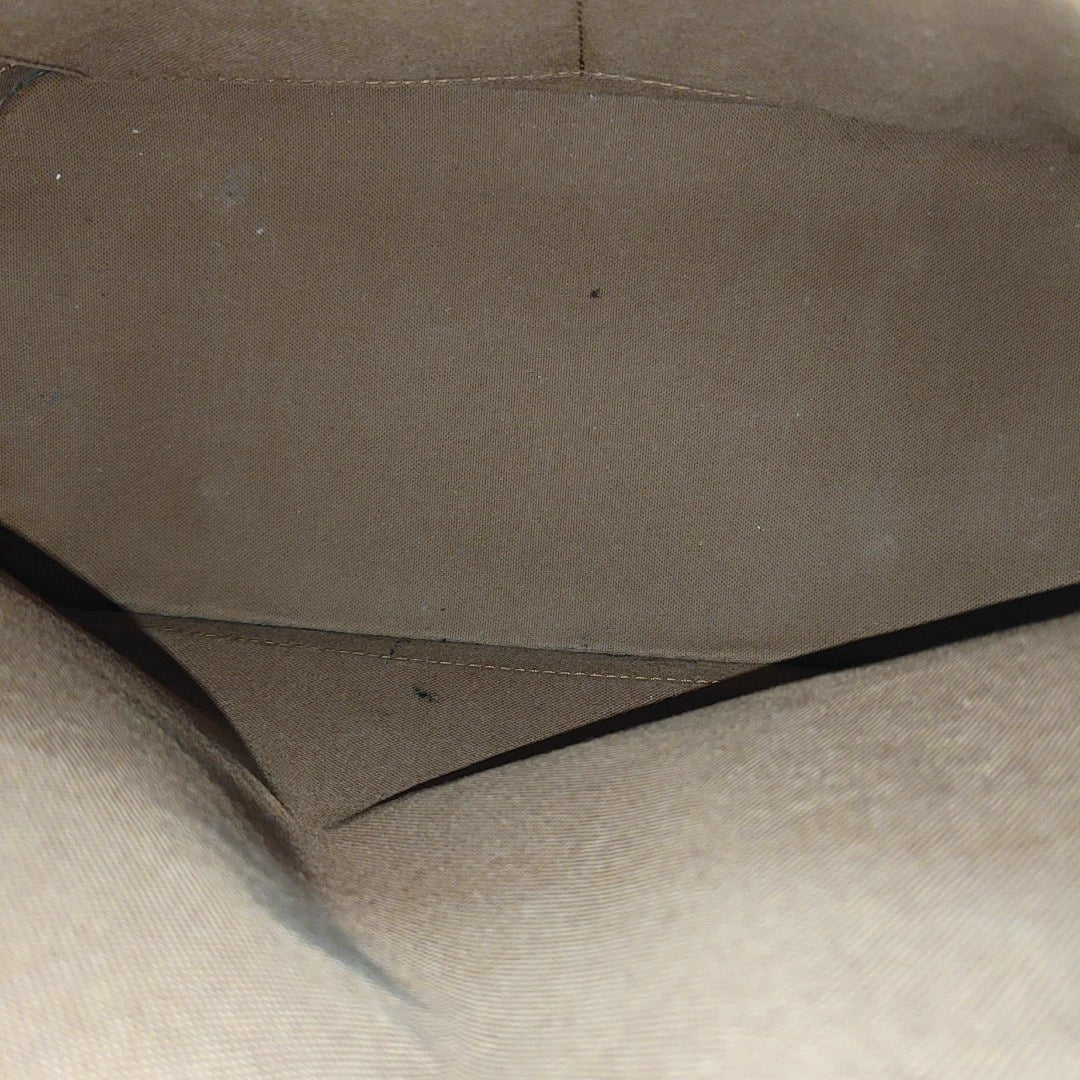 ALMA PM Monogram Coated Canvas Brown
