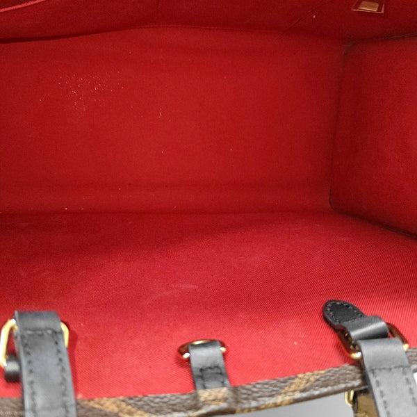 ONTHEGO MM Monogram Coated Canvas Brown