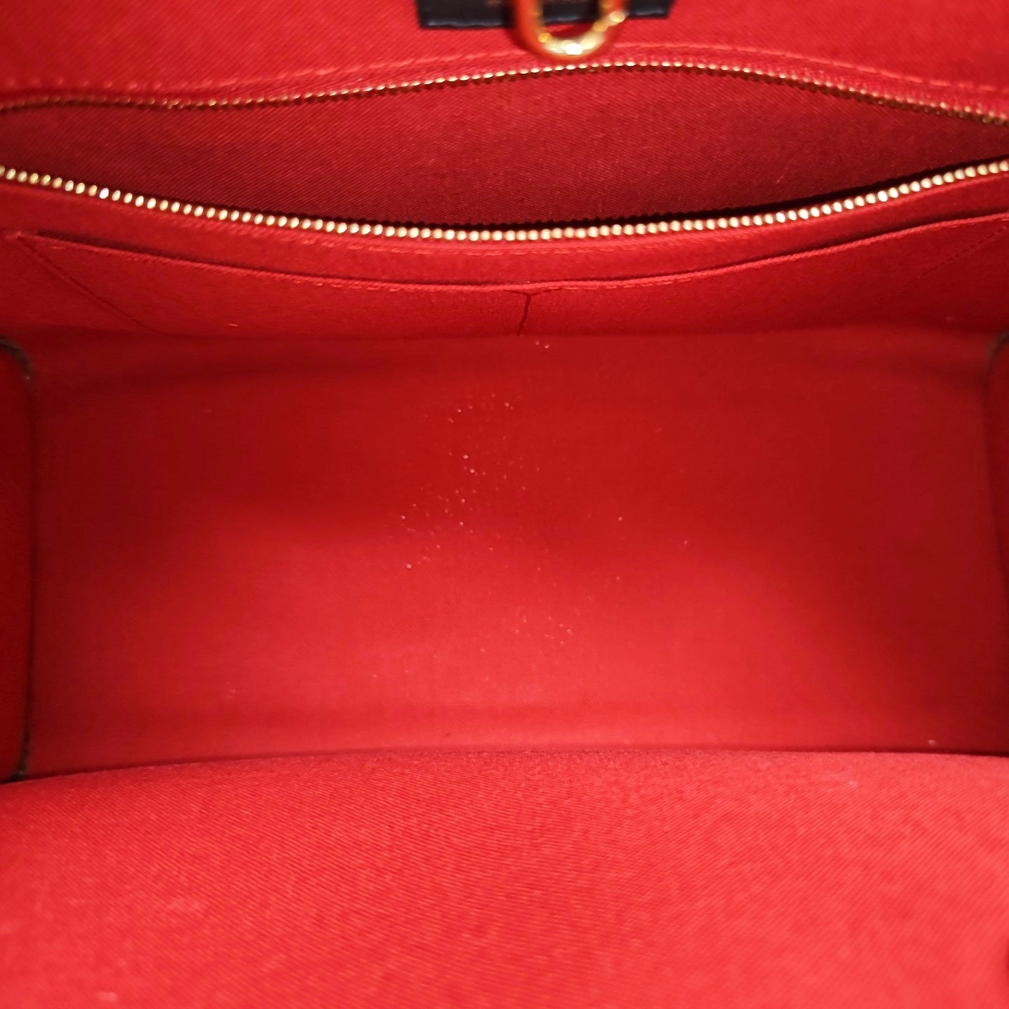 ONTHEGO MM Monogram Coated Canvas Brown