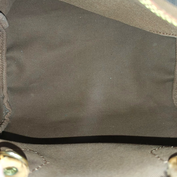 SPEEDY 25 Monogram Coated Canvas Brown