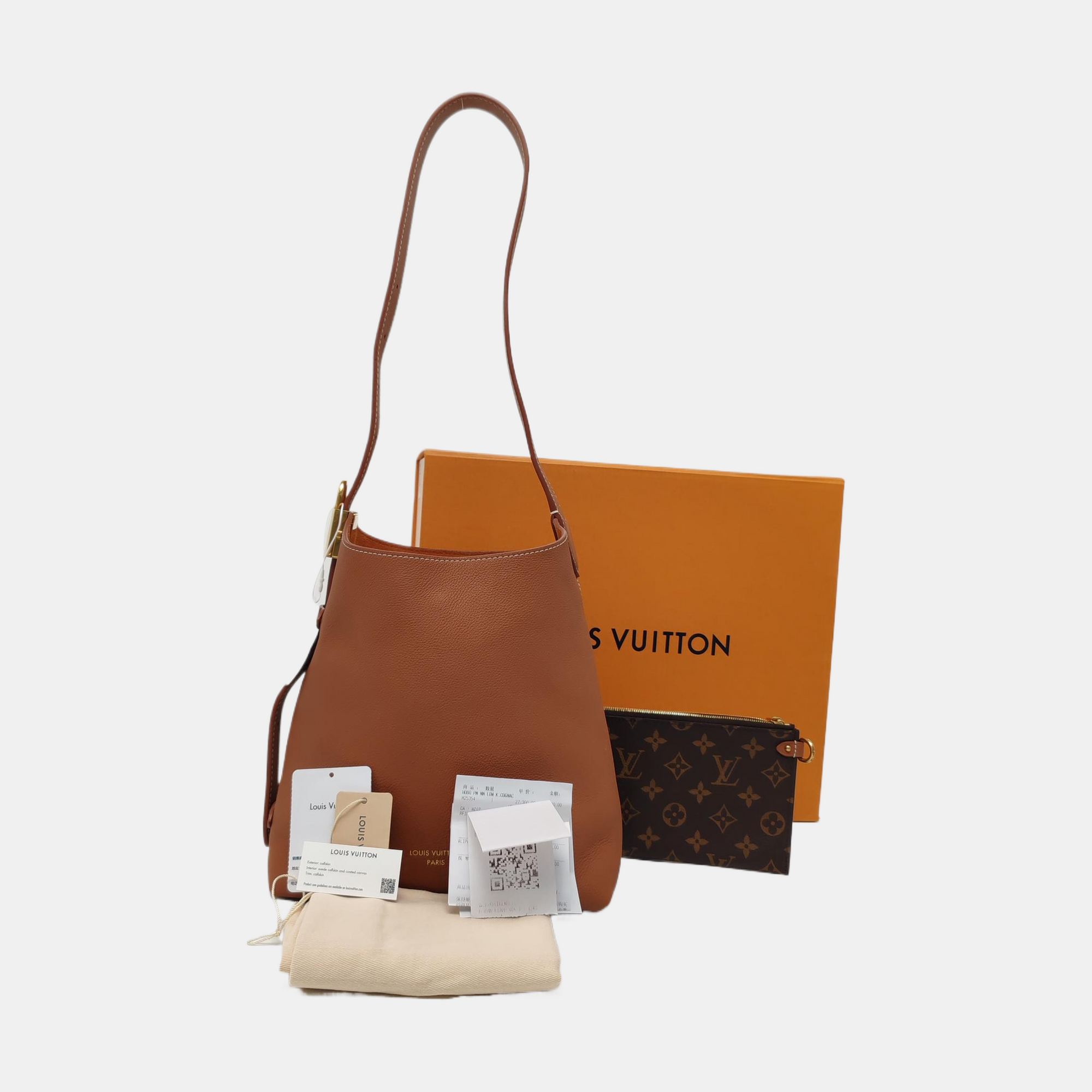 LOW KEY HOBO PM Monogram Calfskin Brown