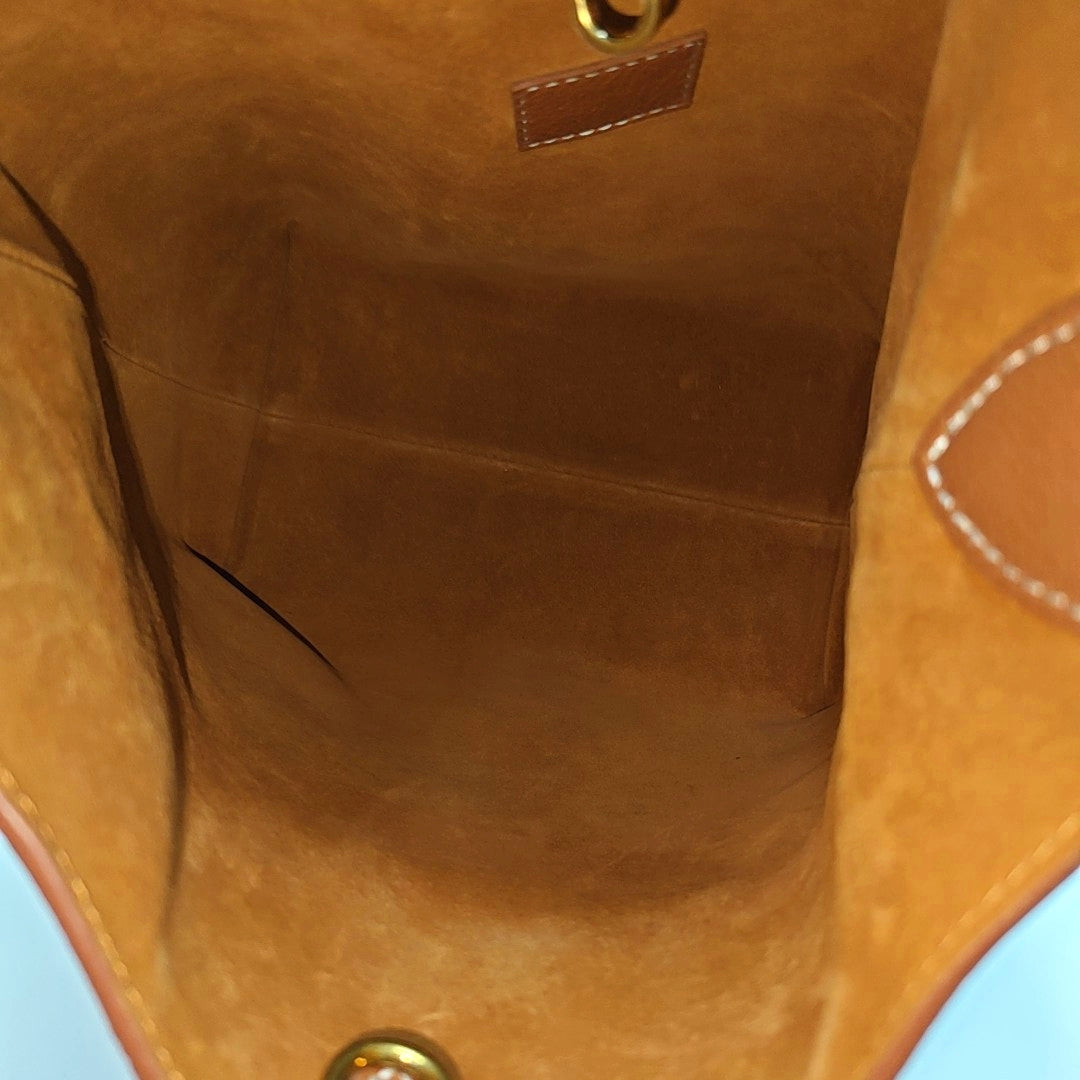 LOW KEY HOBO PM Monogram Calfskin Brown