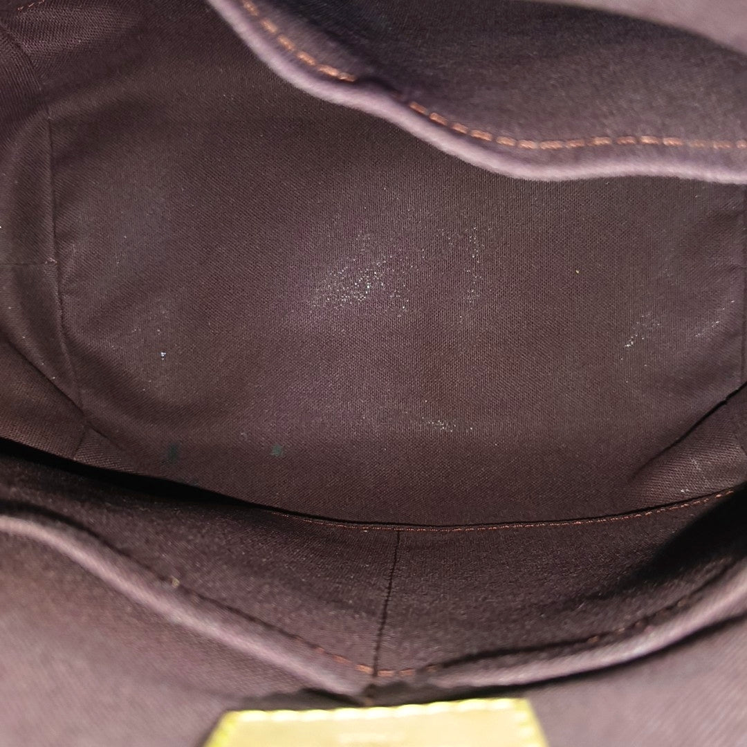 TURENNE Monogram Coated Canvas Brown