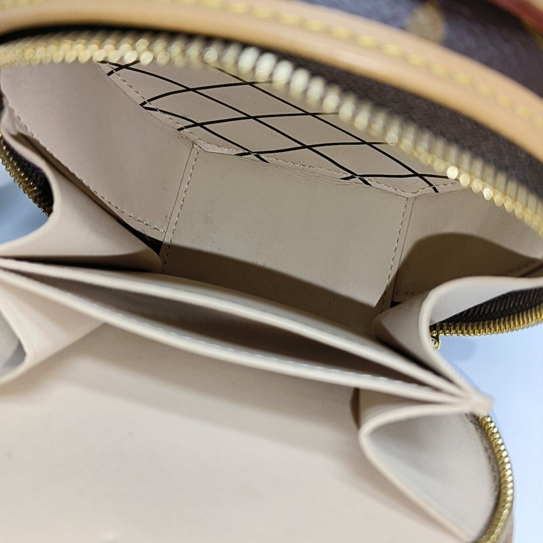 BOITE CHAPEAU Mini Monogram Coated Canvas Brown