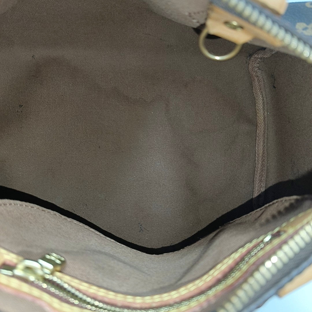 SPEEDY 25 Monogram Coated Canvas Brown