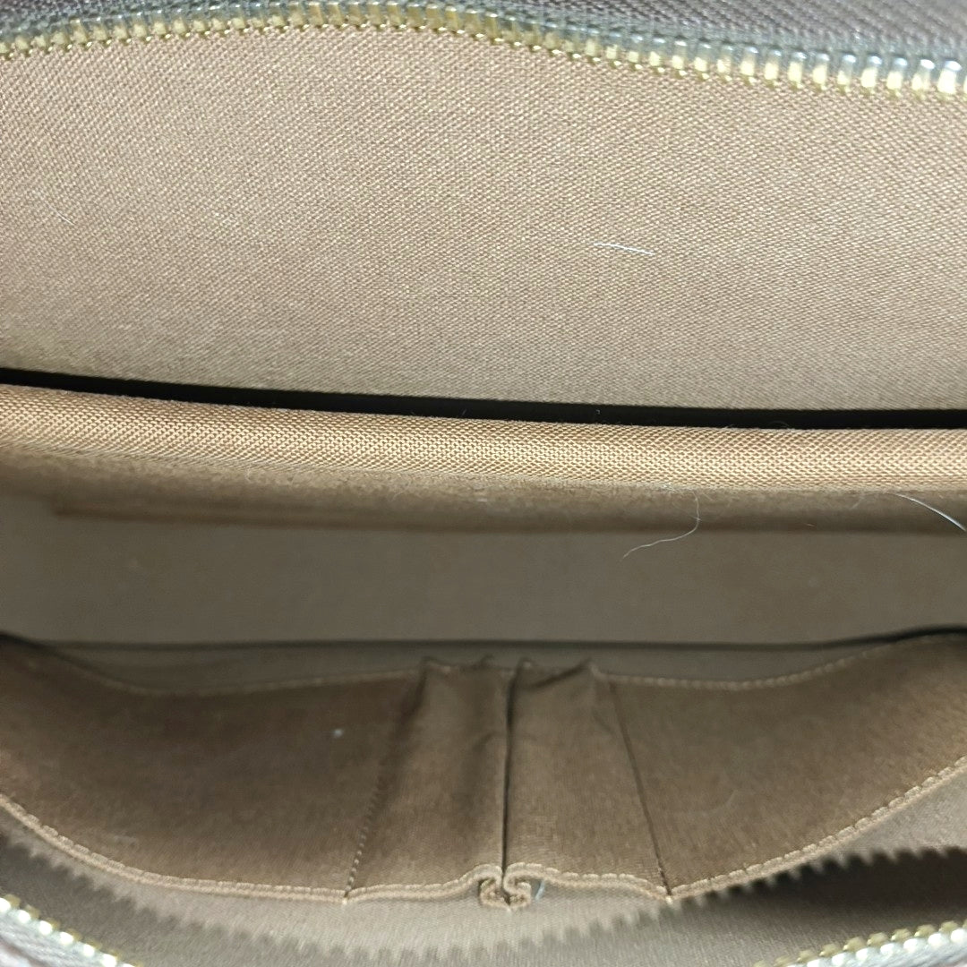 PORTE-DOCUMENTS GM Monogram Coated Canvas Brown