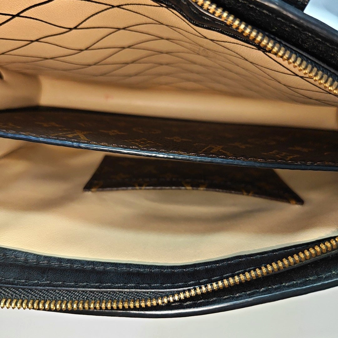 TRUNK Monogram Coated Canvas Brown