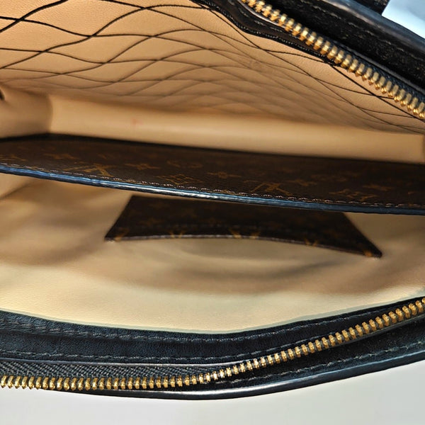 TRUNK Monogram Coated Canvas Brown