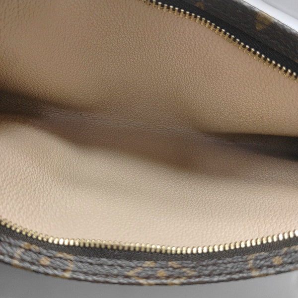 Monogram Coated Canvas Clutch Brown