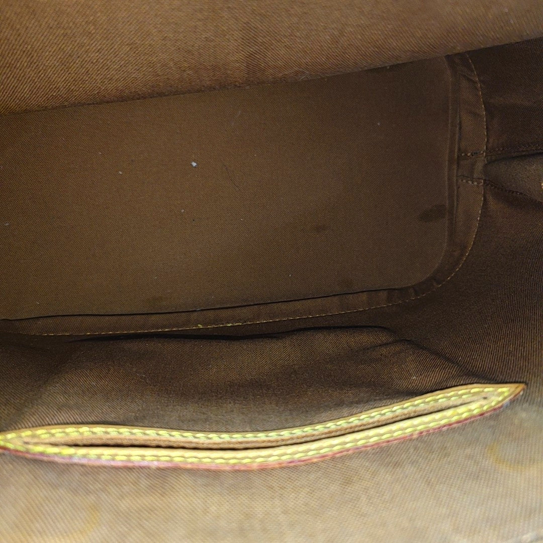 ALMA PM Monogram Coated Canvas Brown