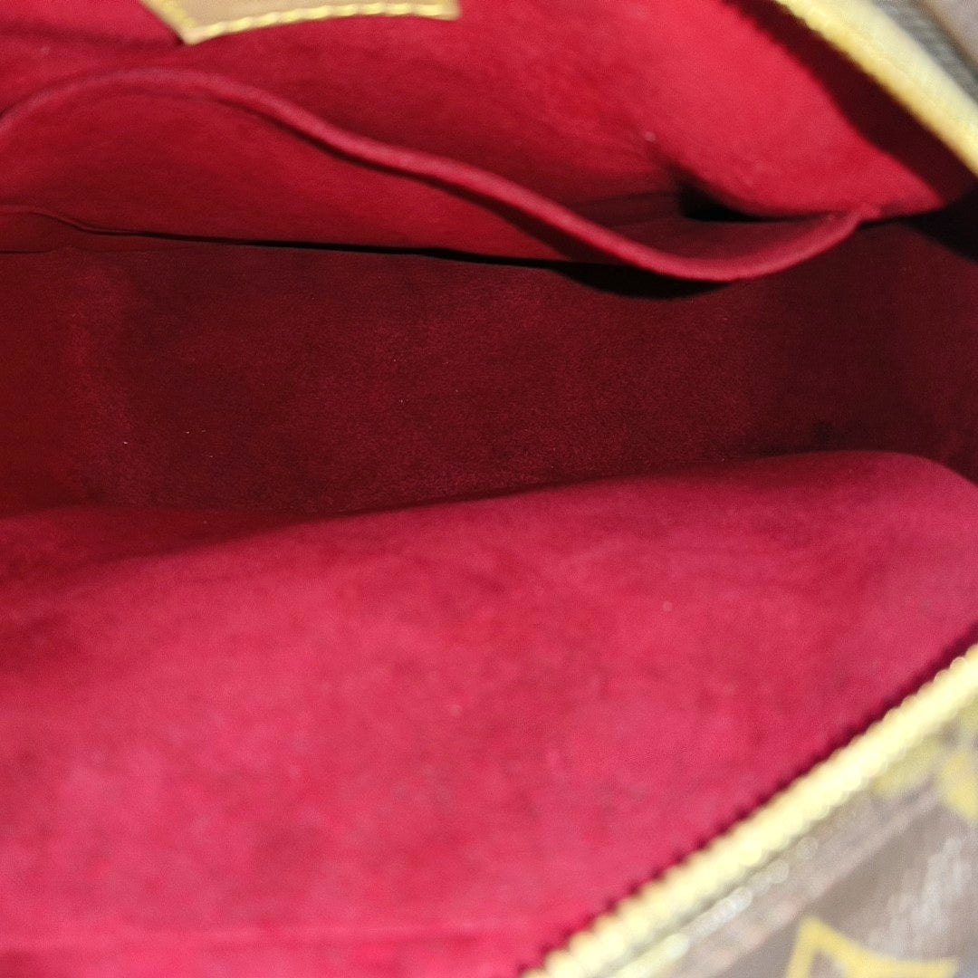 EXCENTRI-CITE Monogram Coated Canvas Brown