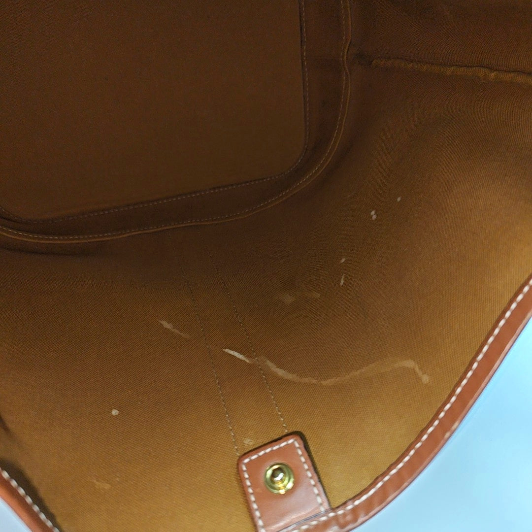 Authenticated pre-owned  TRIOMPHE CANVAS Medium Coated Canvas Brown - Bucket Bag at Looply