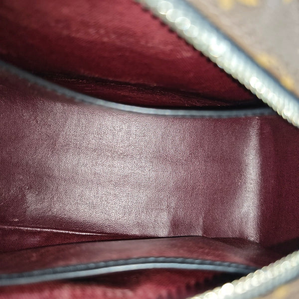 Monogram Coated Canvas Clutch Brown