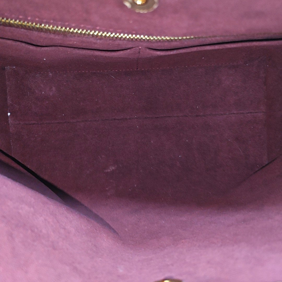 CARRYALL PM Monogram Coated Canvas Brown