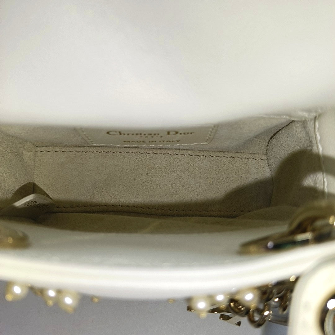 Authenticated pre-owned  Lady Dior Super Mini Quilted Lambskin White - Tote Bag at Looply