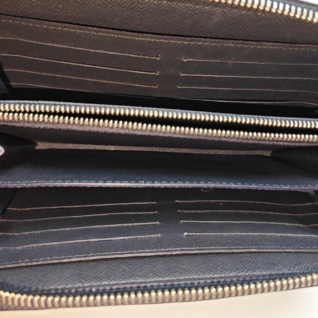 TROUSSE TOILETTE Monogram Coated Canvas Blue
