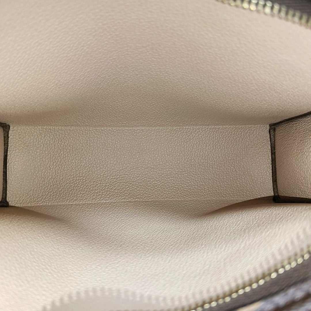 TOILET POCKET 19 Monogram Coated Canvas Brown