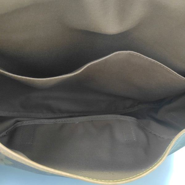 SAUMUR Monogram Coated Canvas Brown