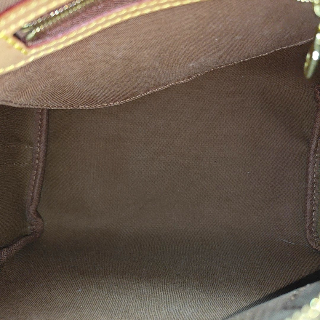 SPEEDY 25 Monogram Coated Canvas Brown