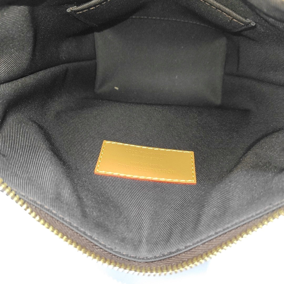 CRUISER Monogram Coated Canvas Brown