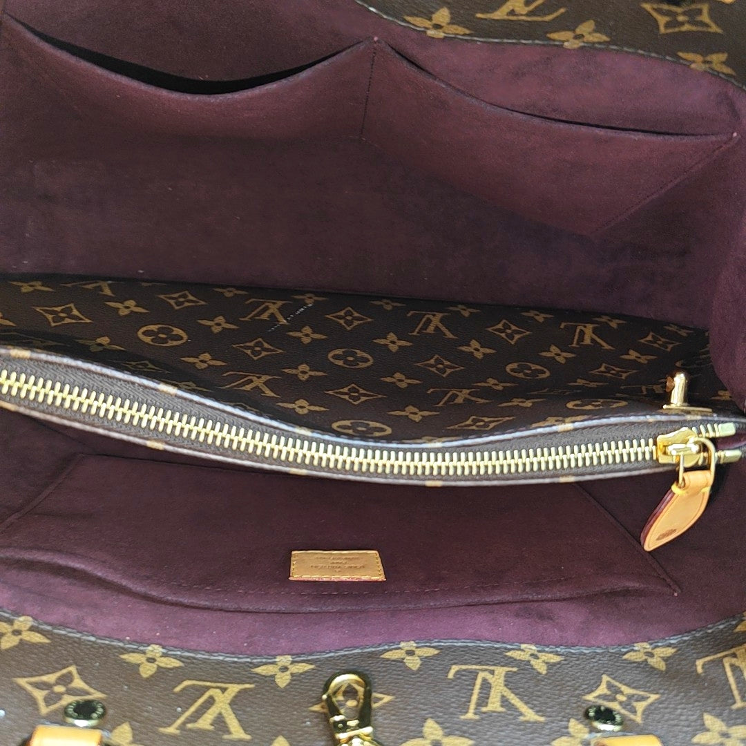 MONTAIGNE GM Monogram Coated Canvas Brown