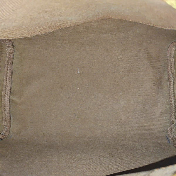 SPEEDY 25 Monogram Coated Canvas Brown