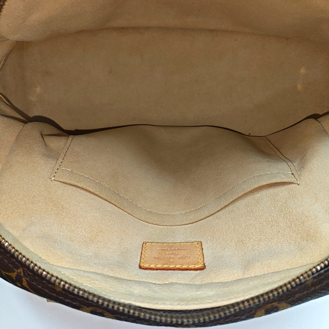 MANHATTAN PM Monogram Coated Canvas Brown