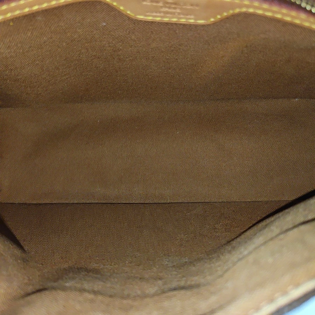 LOOPING PM Monogram Coated Canvas Brown