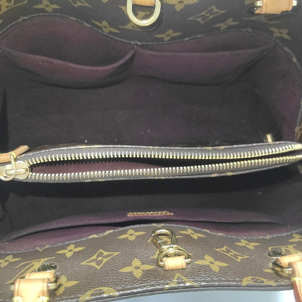 MONTAIGNE GM Monogram Coated Canvas Brown