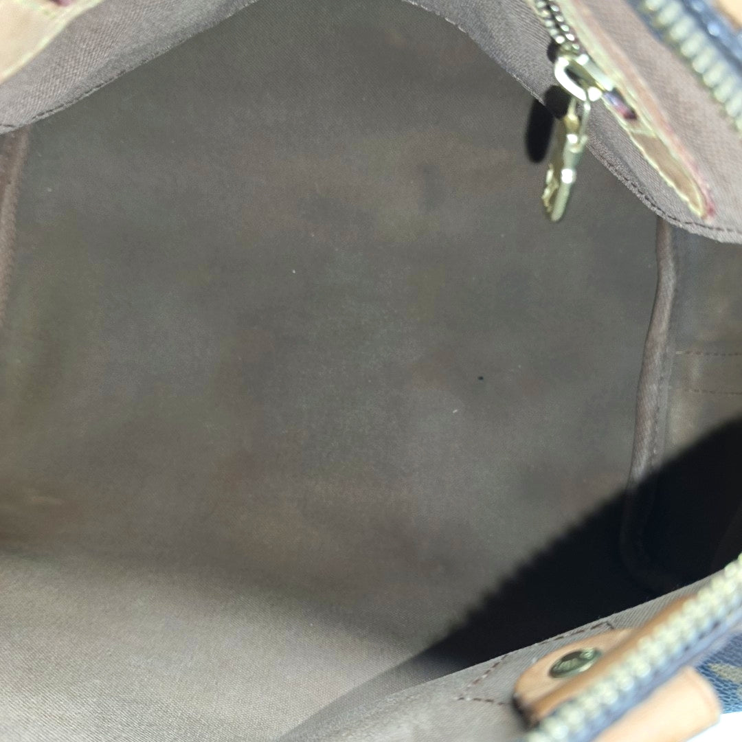 SPEEDY 25 Monogram Coated Canvas Brown