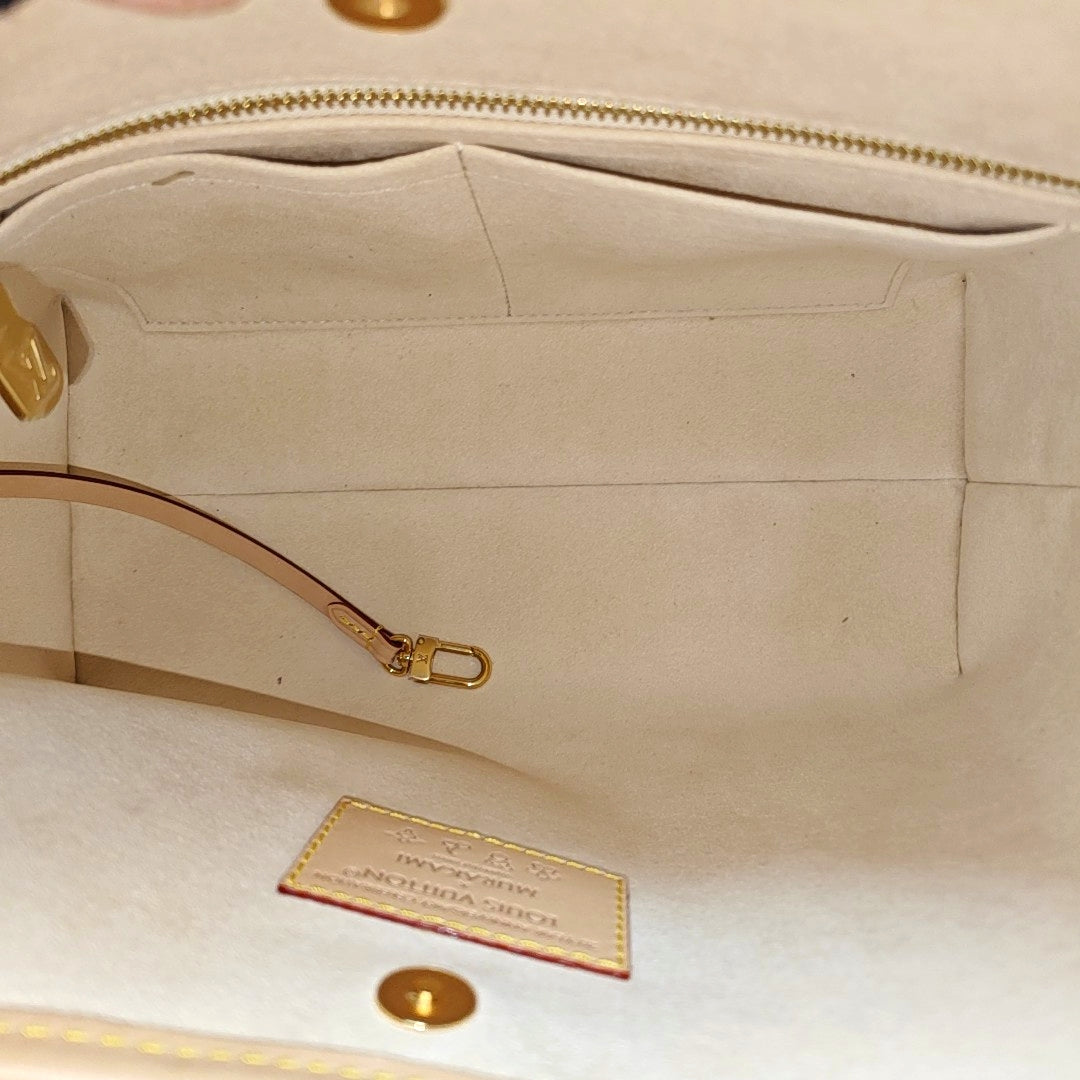 LV × TM CARRYALL PM Monogram Coated Canvas White