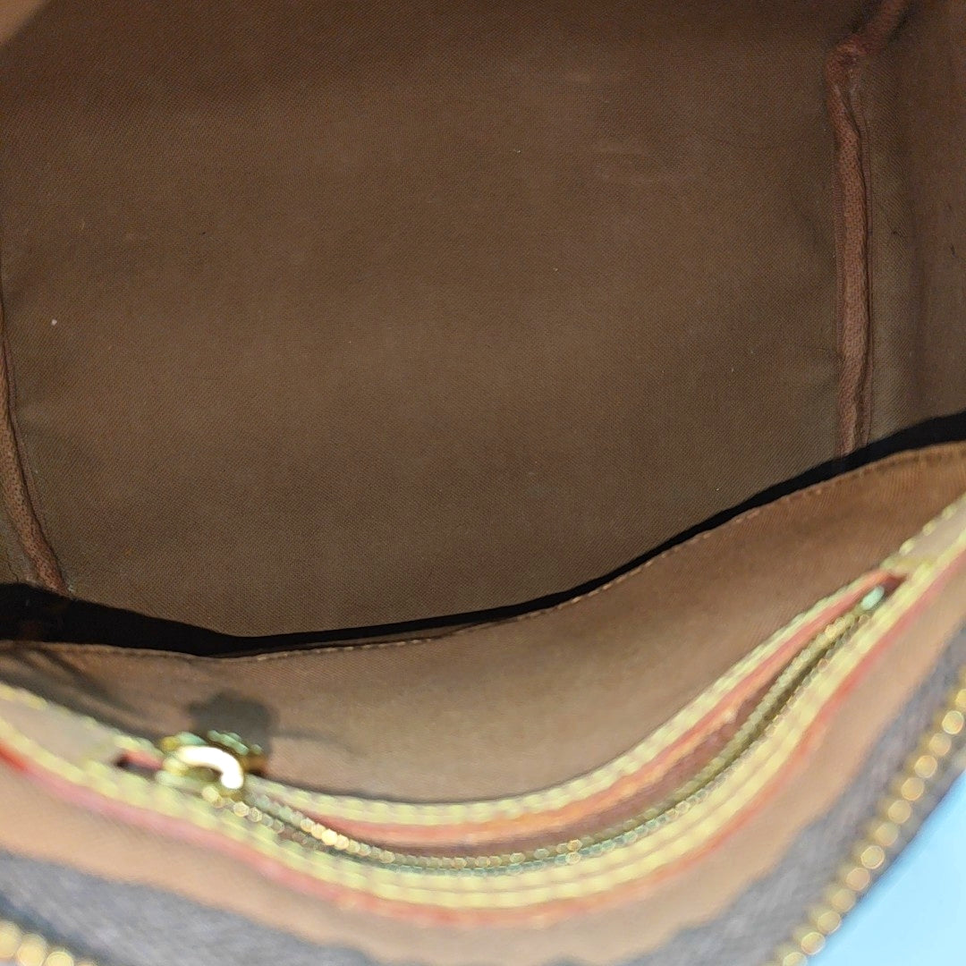 SPEEDY 25 Monogram Coated Canvas Brown