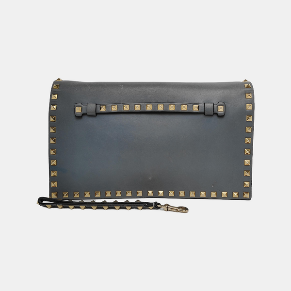 Authenticated pre-owned  Rockstud Calfskin Blue - Clutch at Looply