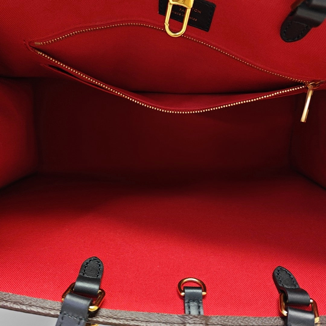 ONTHEGO GM Monogram Coated Canvas Brown