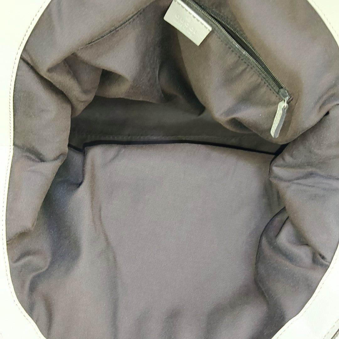 Sukey Monogram Coated Canvas Brown