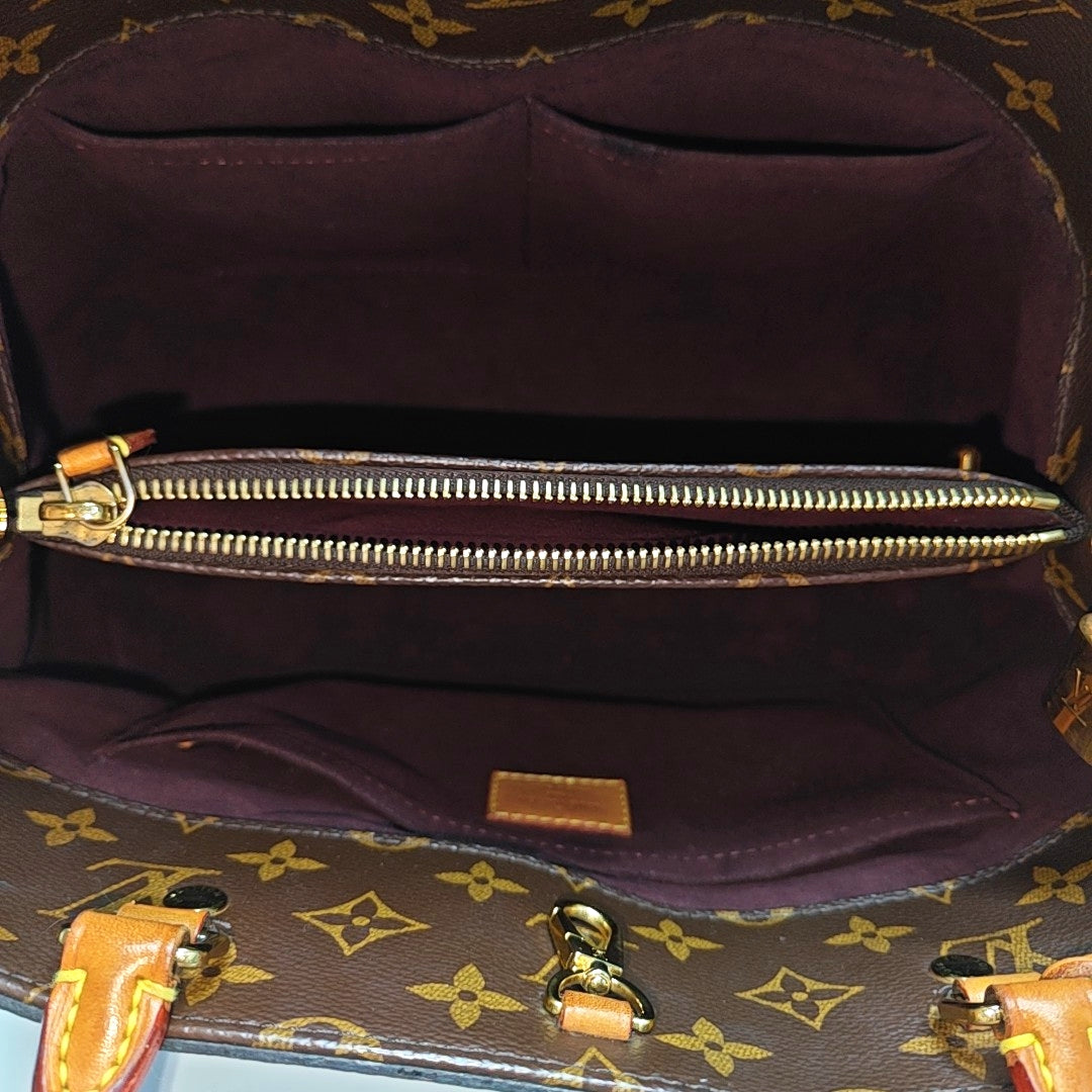 MONTAIGNE Monogram Coated Canvas Brown