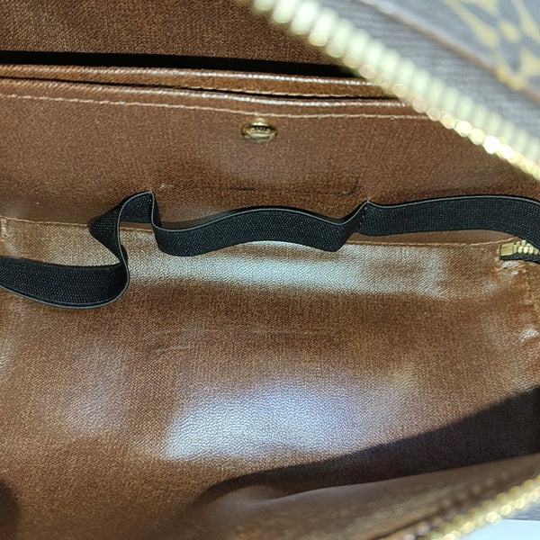 Monogram Coated Canvas Clutch Brown