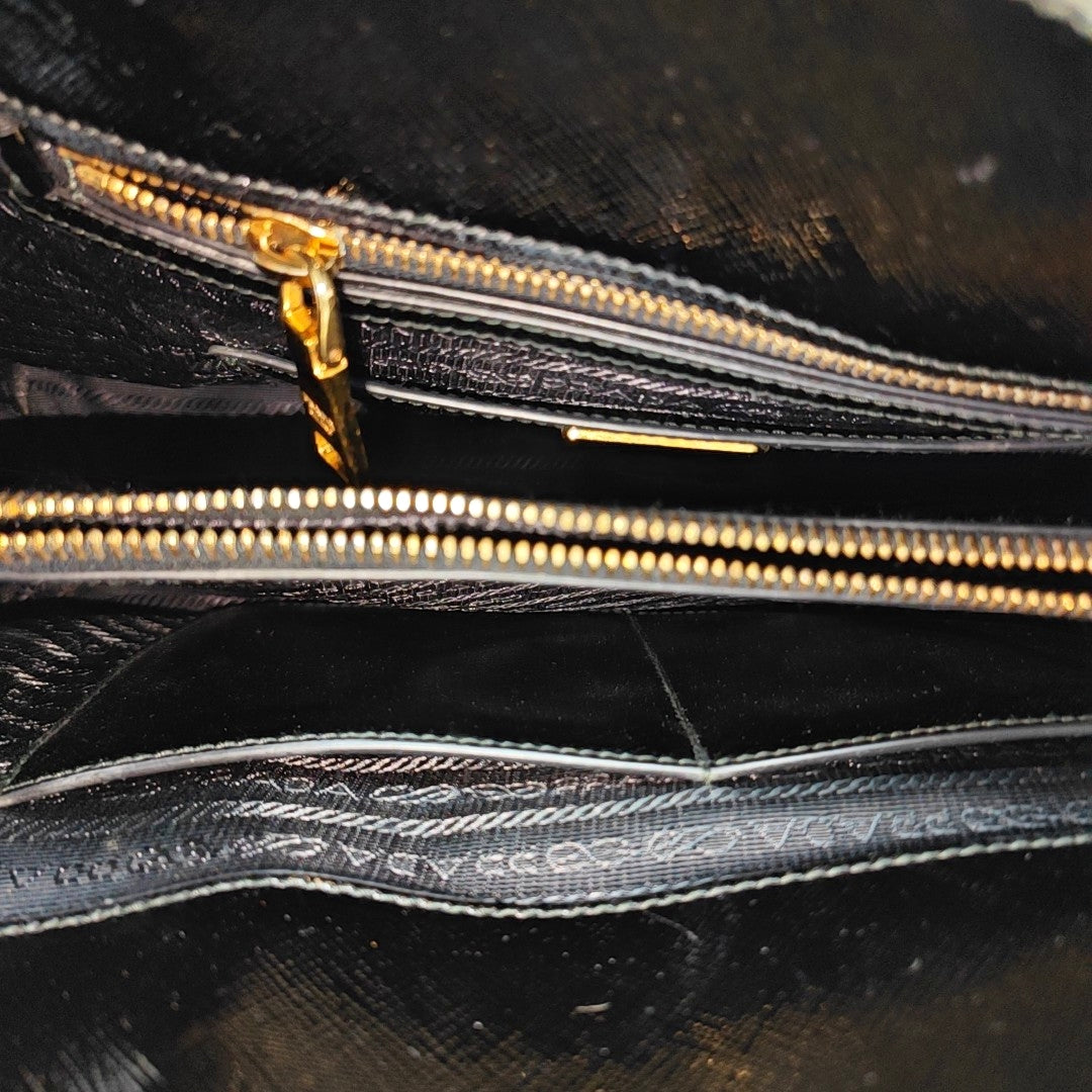 Authenticated pre-owned  Promenade Saffiano Calfskin Black - Top Handle Bag at Looply