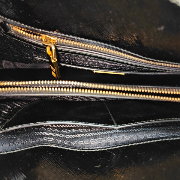 Authenticated pre-owned  Promenade Saffiano Calfskin Black - Top Handle Bag at Looply
