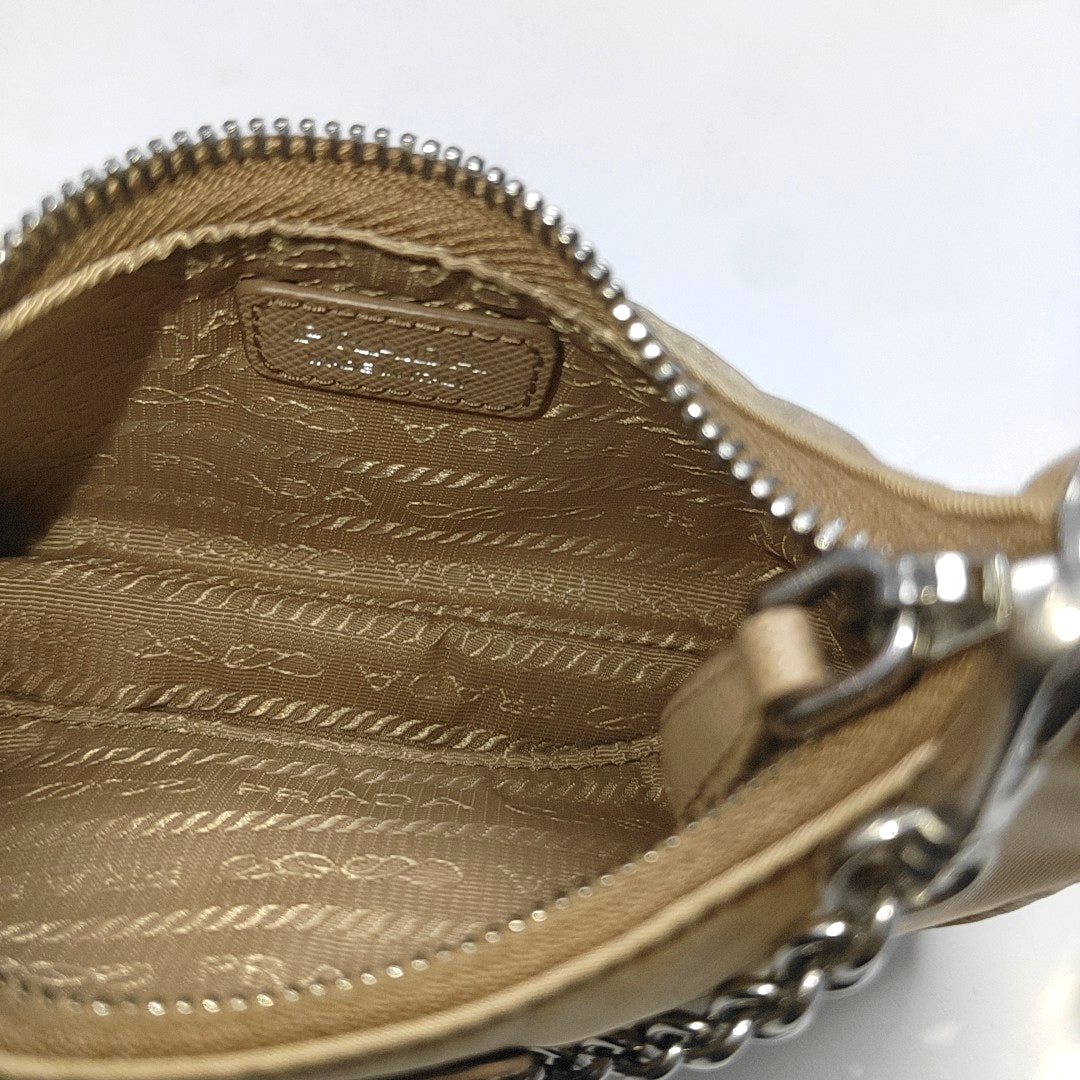 Authenticated pre-owned  Re-Edition Nylon Beige - Shoulder Bag at Looply