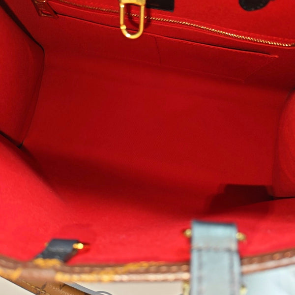 ONTHEGO MM Monogram Coated Canvas Brown