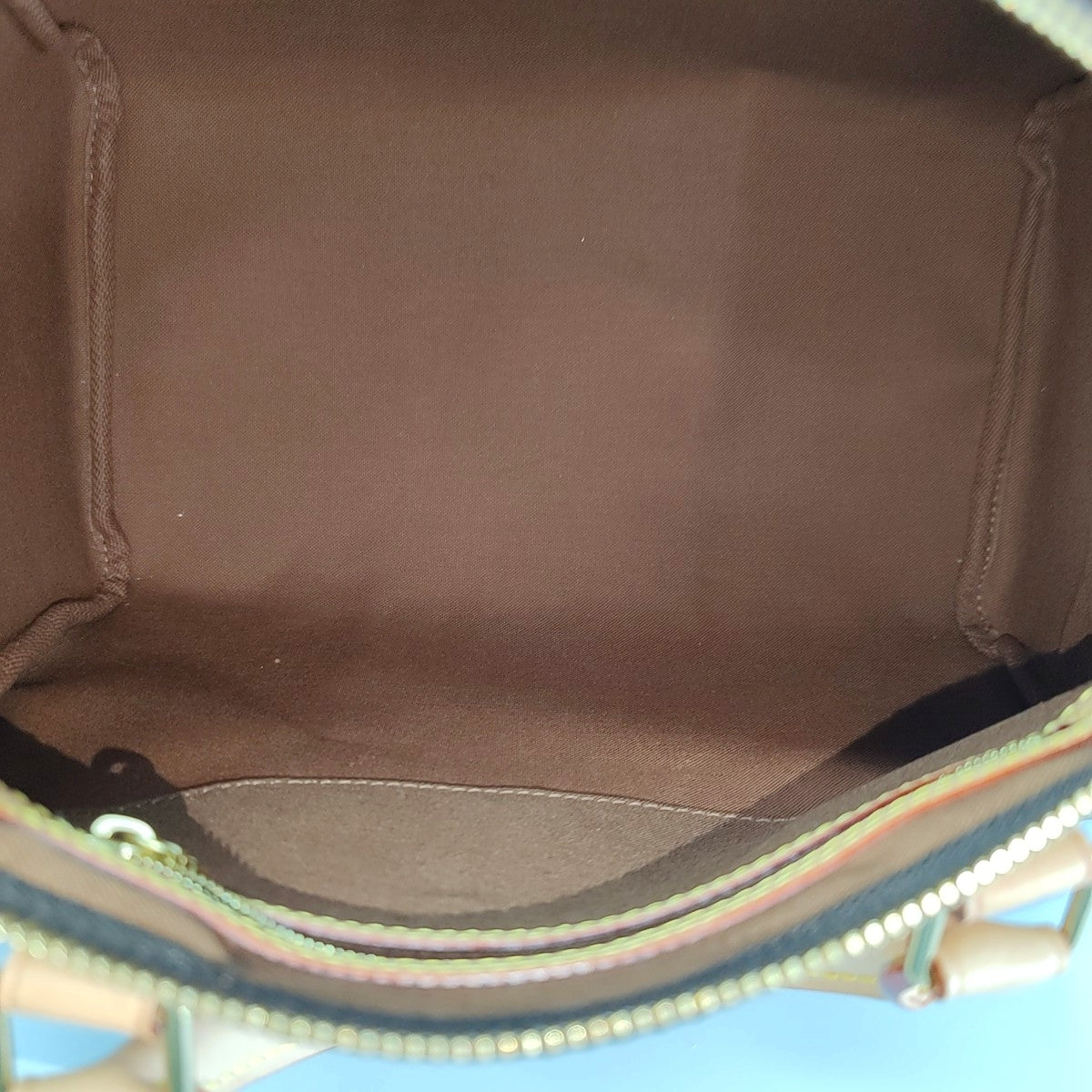 SPEEDY 30 Monogram Coated Canvas Brown