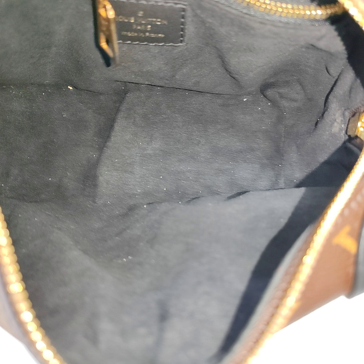 PETITE MALLE Monogram Coated Canvas Brown