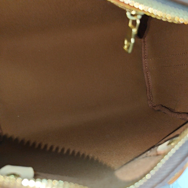 SPEEDY 25 Monogram Coated Canvas Brown