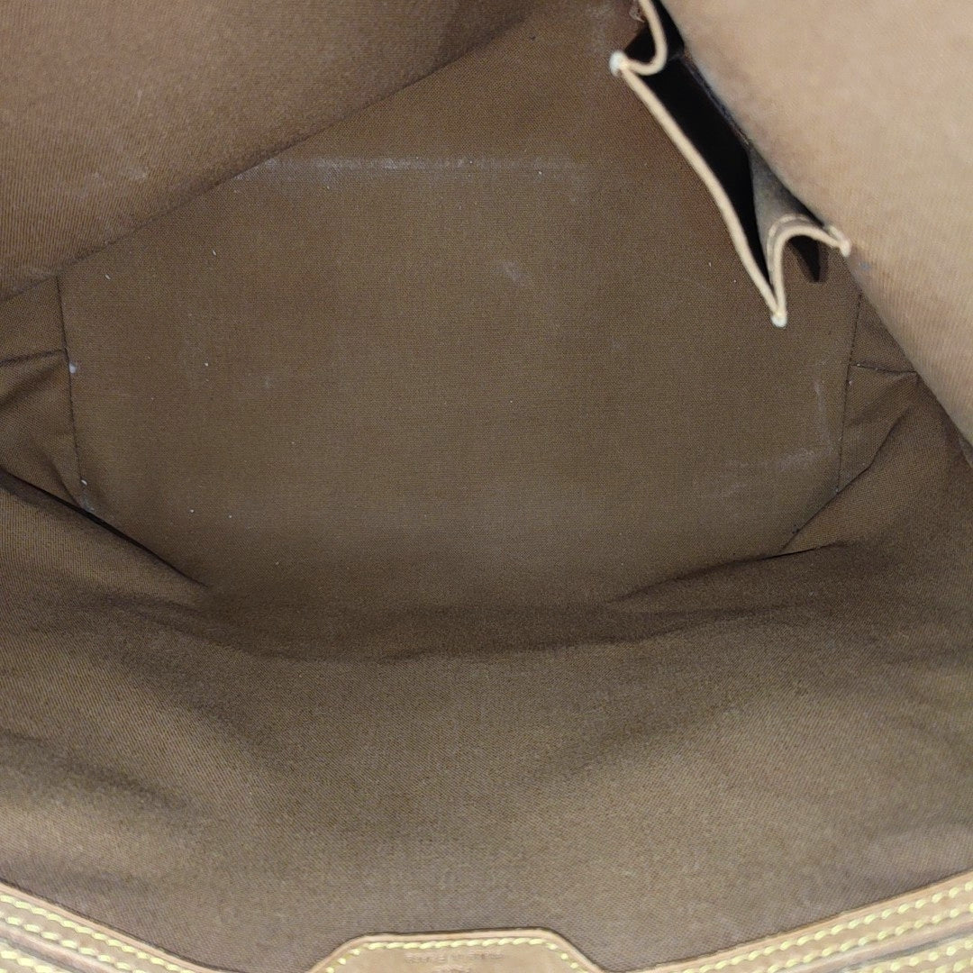 PIANO Monogram Coated Canvas Brown