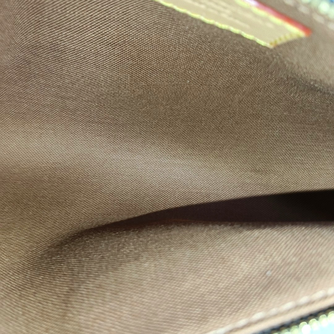 Pochette Eva Monogram Coated Canvas Brown