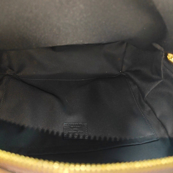Monogram Coated Canvas Backpack Brown